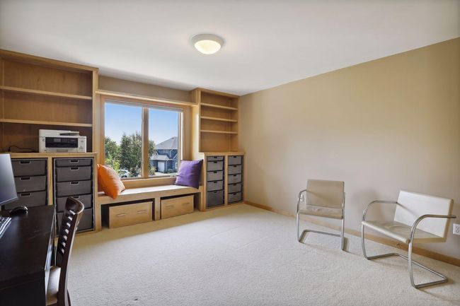 Spacious, upper level 3rd bathroom with awesome storage, built-ins. No dresser needed! Easy access to the awesome, Jack and Jill attached bathroom. Bring a book, pillows and chill in the fabulous bench seating w/ large window! | Image 30