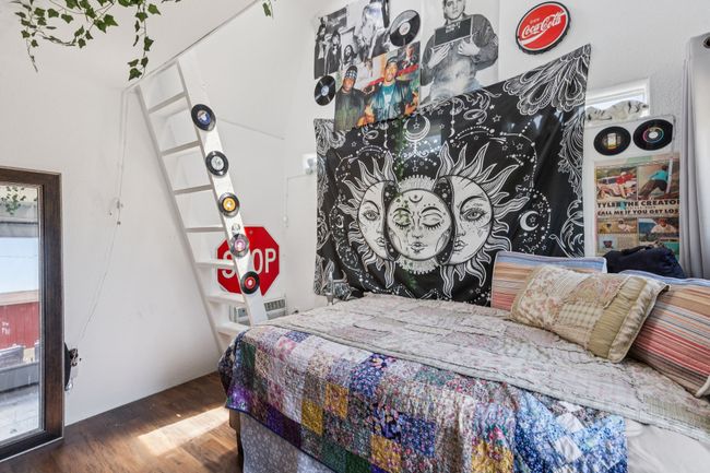 She Shed with HVAC Lofted Bedroom and Den featuring wood finished floors | Image 24