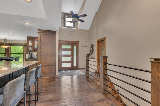 Welcoming entryway offers stunning views of the lake the moment you walk in. | Image 6