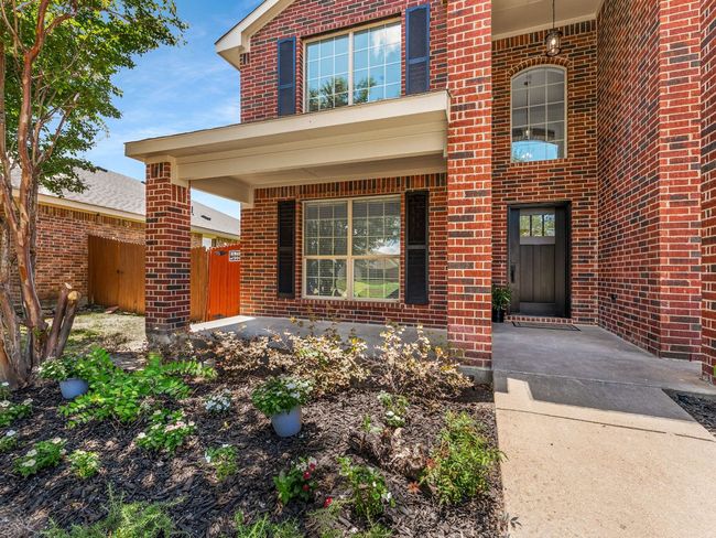 Property entrance with brick siding | Image 4