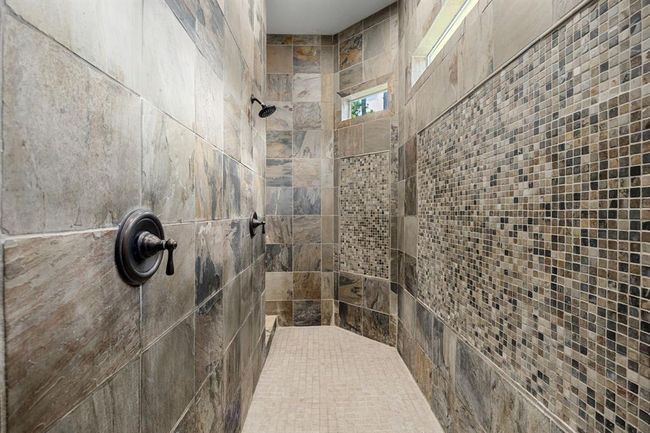 Primary shower offers a spa-like setting as you unwind for the day! | Image 23