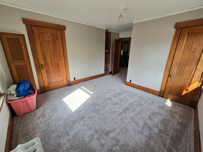 Built in ironing board & 2 closets | Image 41