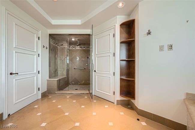 Full bathroom with a shower stall, baseboards, recessed lighting, and tile patterned flooring | Image 20