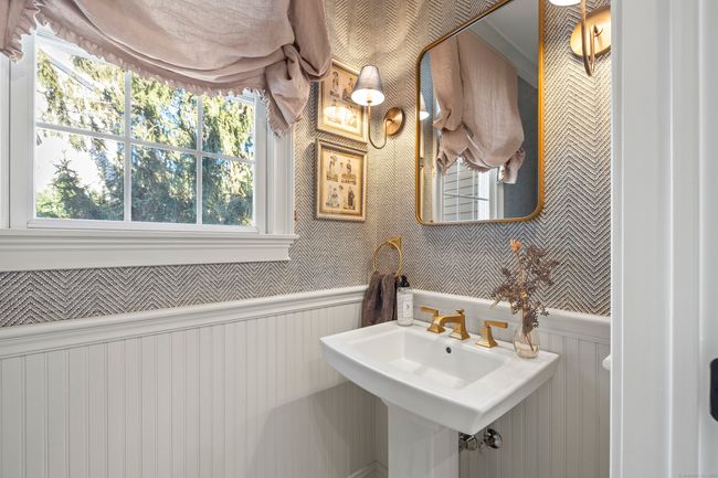 Newly designed powder room off main entrance | Image 10
