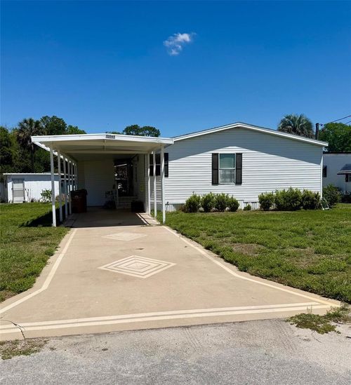 13519 Woodland Dr, ASTATULA, FL, 34705-9515 | Card Image