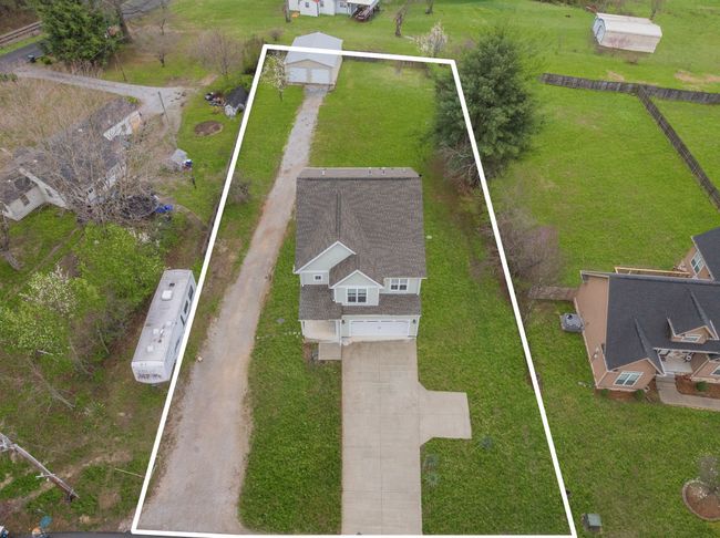 AERIAL Photo w/ Approximate Lines by Photography Companyt NOTE: Rely on Actual SURVEY ONLY for exact property lines Exterior Photos have Green Grass Edits | Image 35