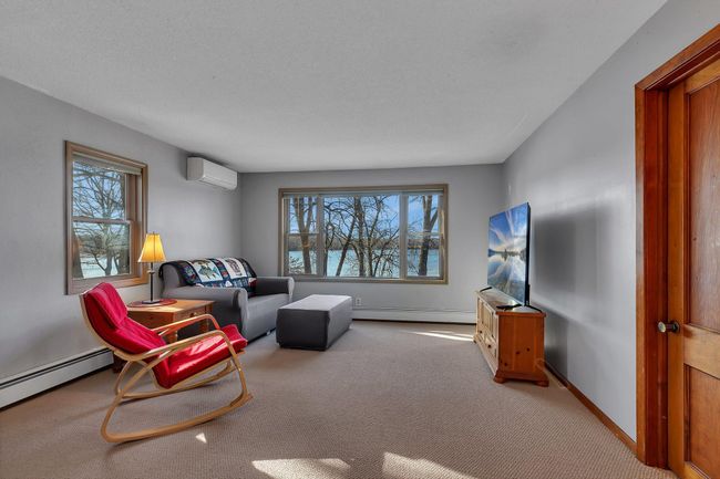 Upper Level Family room is sunny and bright. Includes room darkening shades in case you would like to use this as a third bedroom. | Image 12