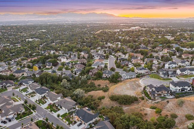 Aerial view at dusk of a mountain view and a residential view | Image 10