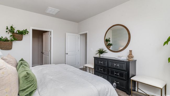 Bedroom featuring wood finished floors | Image 15