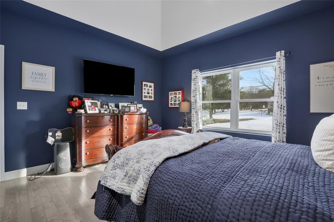 Bedroom featuring wood-type flooring | Image 14