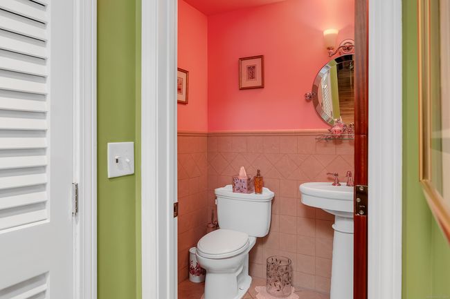 The first floor powder room with pedestal sink. | Image 10