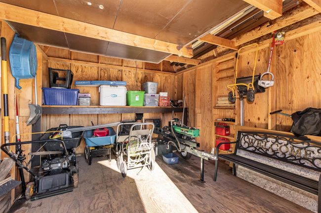 The storage shed provides tons of space for all your tools & toys. | Image 33