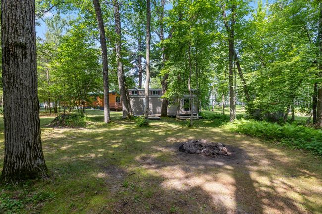 Guests can enjoy privacy and a bonfire at night! | Image 32