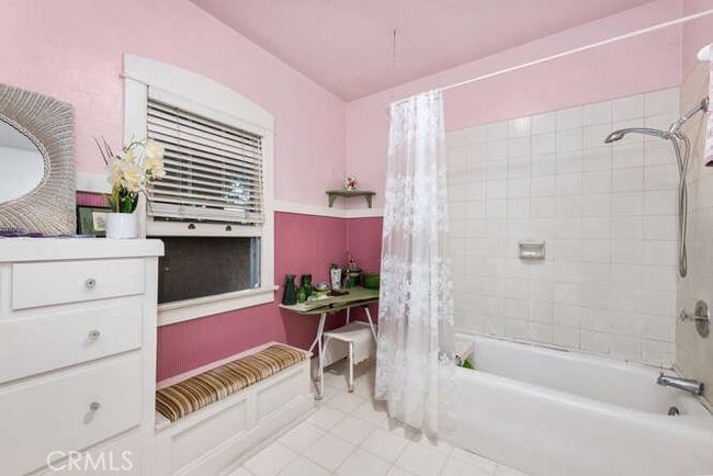 Bathroom with shower in the tub | Image 28