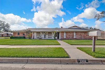 Single story home with a front yard | Image 1