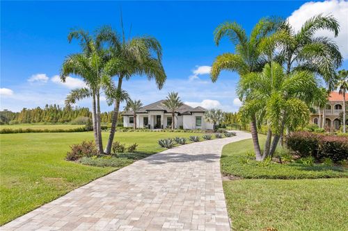 10521 Broadland Pass, THONOTOSASSA, FL, 33592-3942 | Card Image