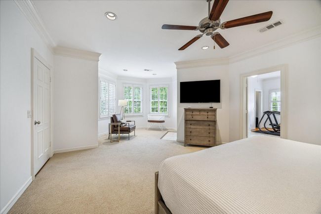 View of the sitting area across from primary bedroom. Lots of natural light flows into this room through the oversized windows. | Image 18