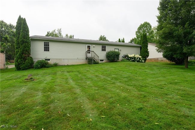 Back of property featuring a yard | Image 25