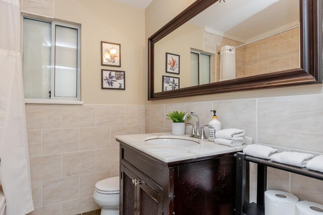 Tastefully updated main bathroom | Image 25