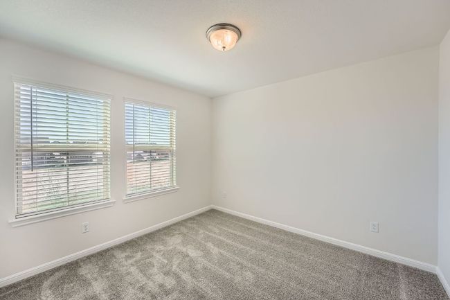 Empty room featuring carpet and baseboards | Image 19