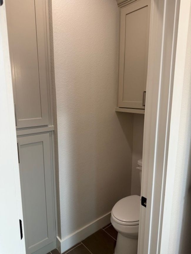 MASTER Bathroom featuring tile patterned floors and toilet | Image 36
