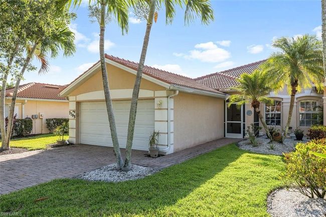 View of side of home featuring a garage and a yard | Image 4