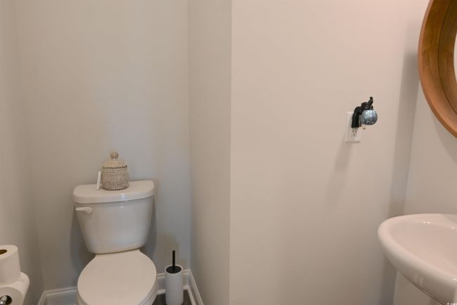 Half bath with toilet and a sink | Image 14