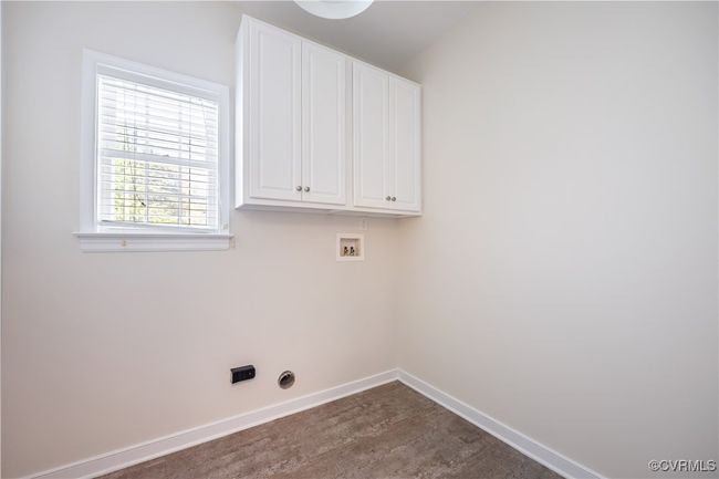 Downstairs, and spacious, the Laundry Room is BIG! It'll be EZ to keep up with this chore while still cooking, eating and entertaining. | Image 20