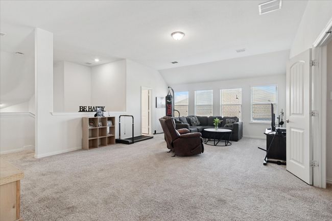 Upstairs, children and guests alike will enjoy the spacious game room, a dedicated media room, two generously sized secondary bedrooms, and an additional full bath. | Image 31