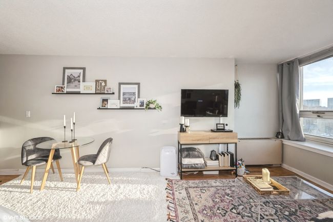 Engineered wood flooring under throw carpets. | Image 5