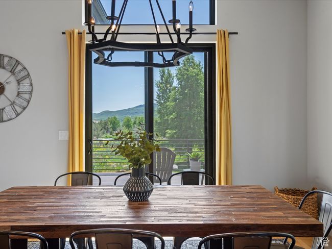 Dining space featuring a chandelier | Image 22