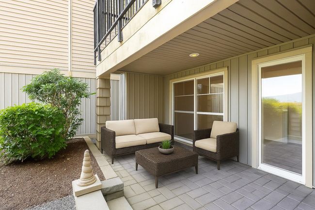View of patio featuring outdoor lounge area and a balcony | Image 21