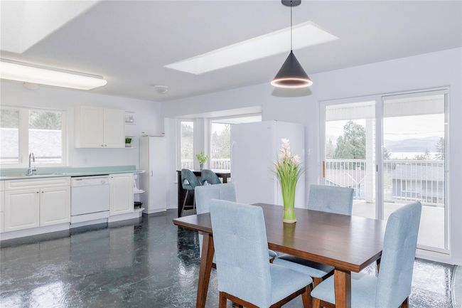 Skylights and plenty of room for dining space | Image 11