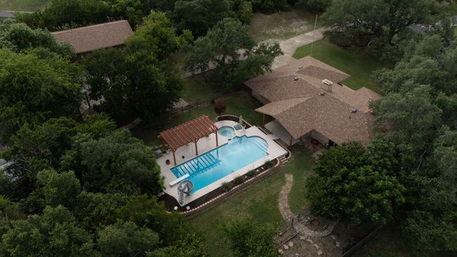 View of subject property featuring a pool area | Image 39