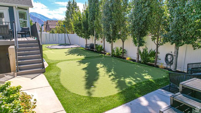 View of yard with a mountain view and a fenced backyard | Image 9