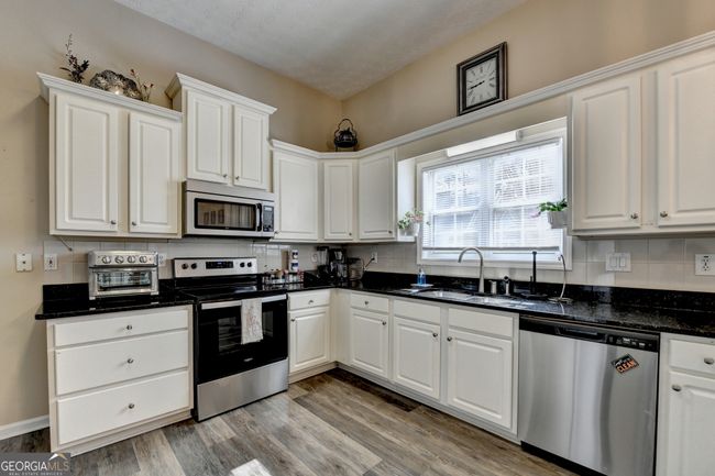 305 Morning Glen Dr, House other with 4 bedrooms, 2 bathrooms and 2 parking in Suwanee GA | Image 24
