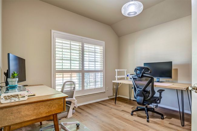 Home office with baseboards, light wood-style floors, and lofted ceiling | Image 6