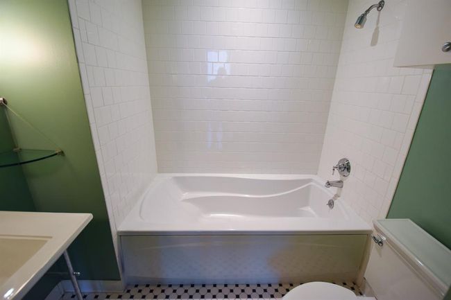 Another angle of the second bathroom, showcasing the relaxing soaking tub alongside a separate shower. | Image 34