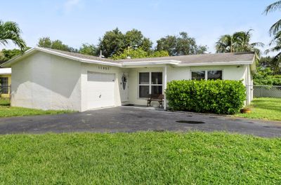 11951 Nw 33rd St, House other with 3 bedrooms, 2 bathrooms and null parking in Sunrise FL | Image 1