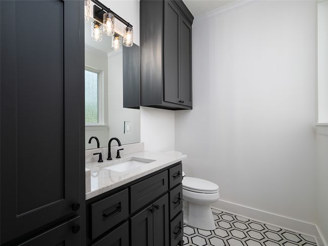 Bathroom with crown molding and vanity | Image 24