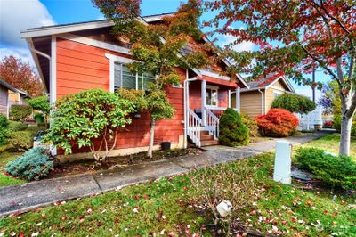 Cozy cottage style community and landscaping included in the HOA. | Image 2