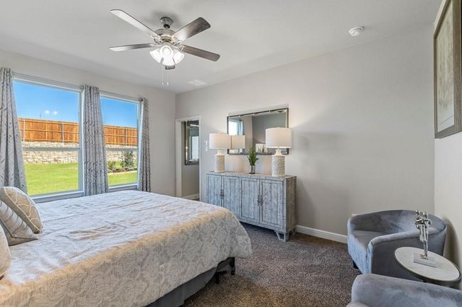 Carpeted bedroom with baseboards and a ceiling fan | Image 16