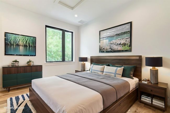 Bedroom with light wood-style floors, attic access, and recessed lighting | Image 11