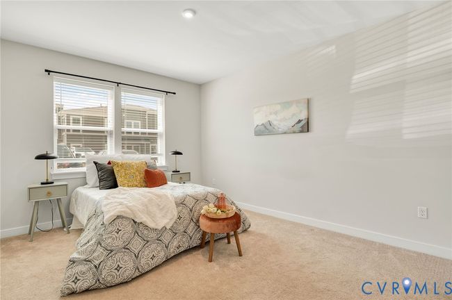 Carpeted bedroom featuring baseboards | Image 12