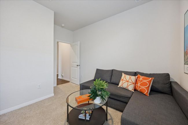Living area with carpet floors and baseboards | Image 31