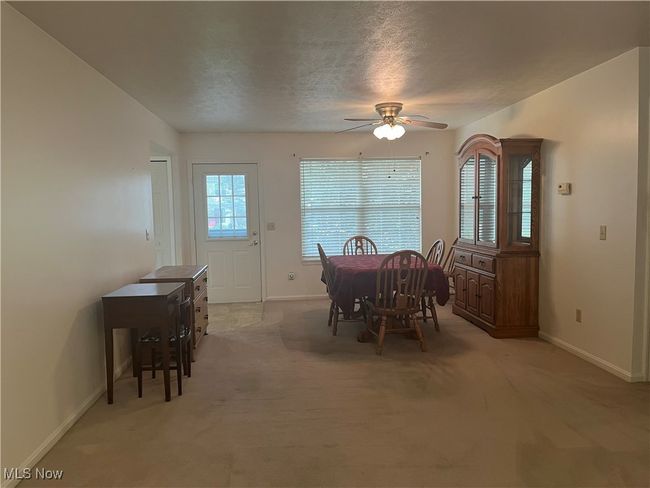 View of the Dining Room from the Living Room area. | Image 9