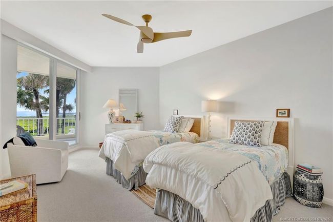 Guest bedroom #2 with ocean views and balcony access | Image 29