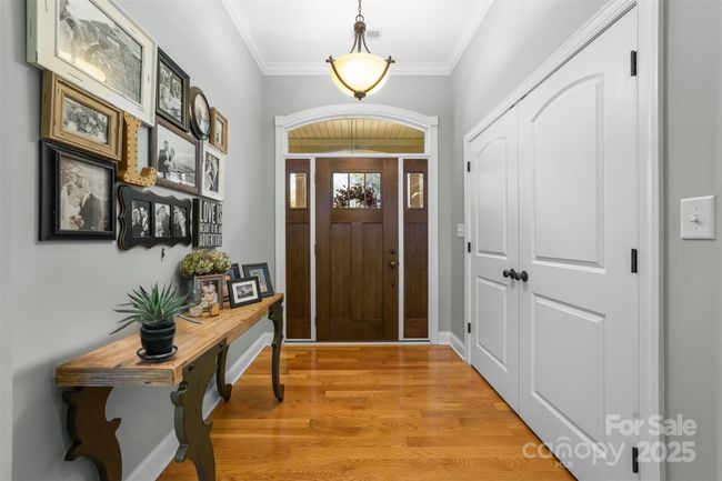 Foyer entrance with large coat closet. | Image 38