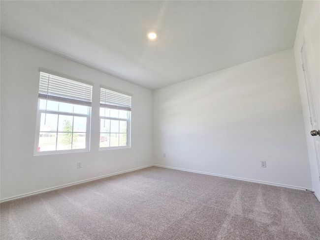 Carpeted empty room with baseboards | Image 32