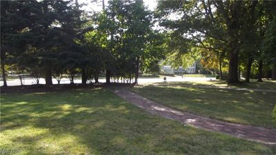 View of yard with Paved Walkway | Image 3